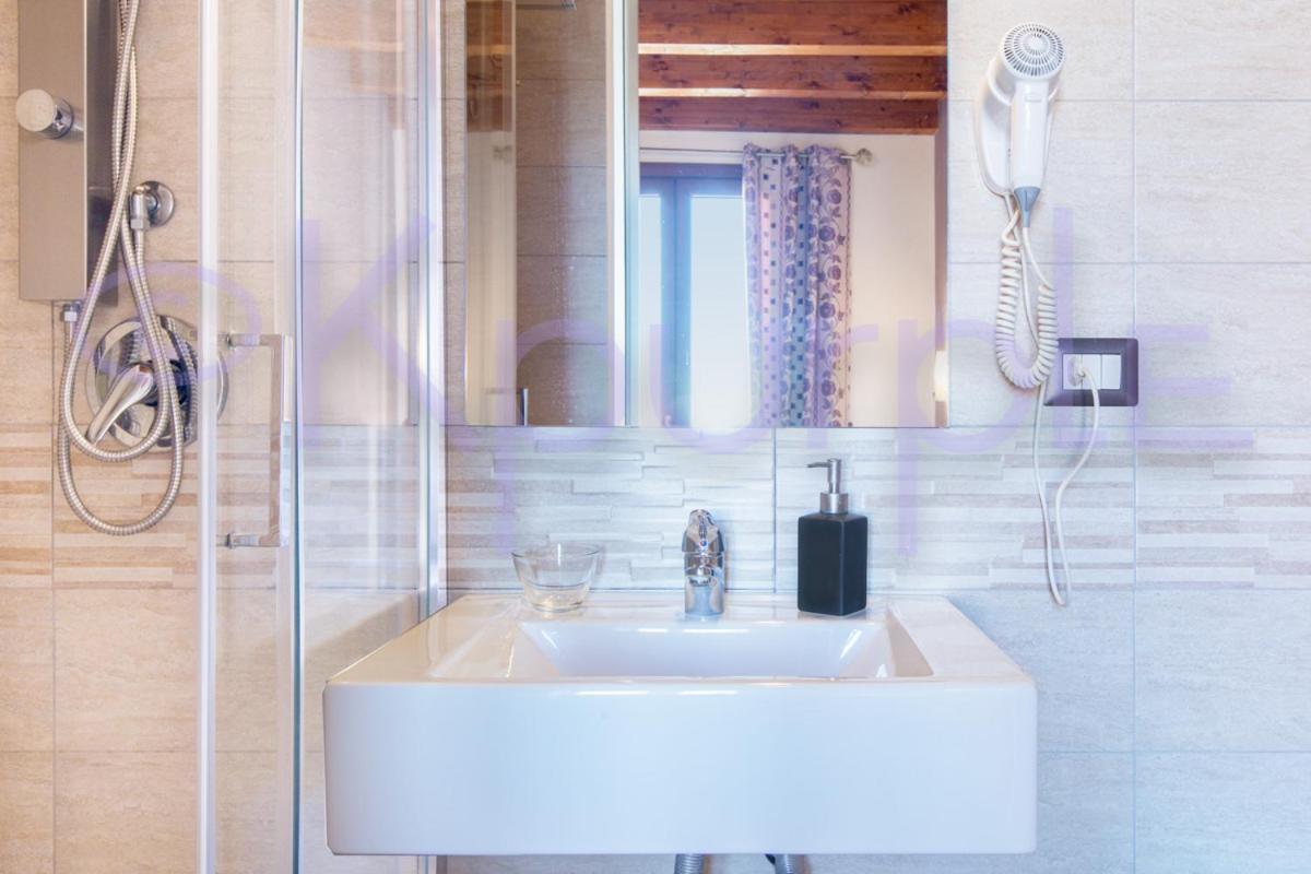 Le Api Hotel กาญารี ภายนอก รูปภาพ