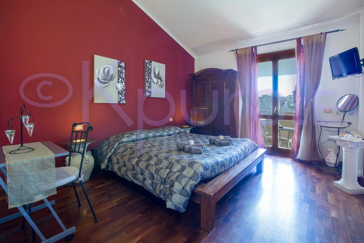 Le Api Hotel กาญารี ภายนอก รูปภาพ