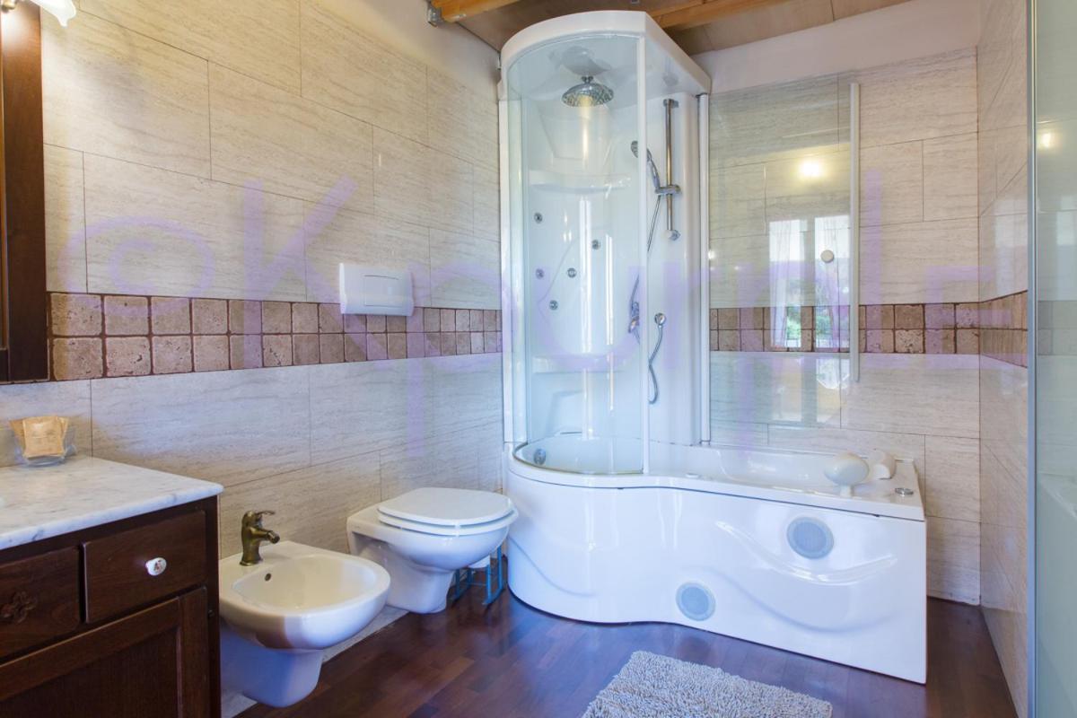 Le Api Hotel กาญารี ภายนอก รูปภาพ