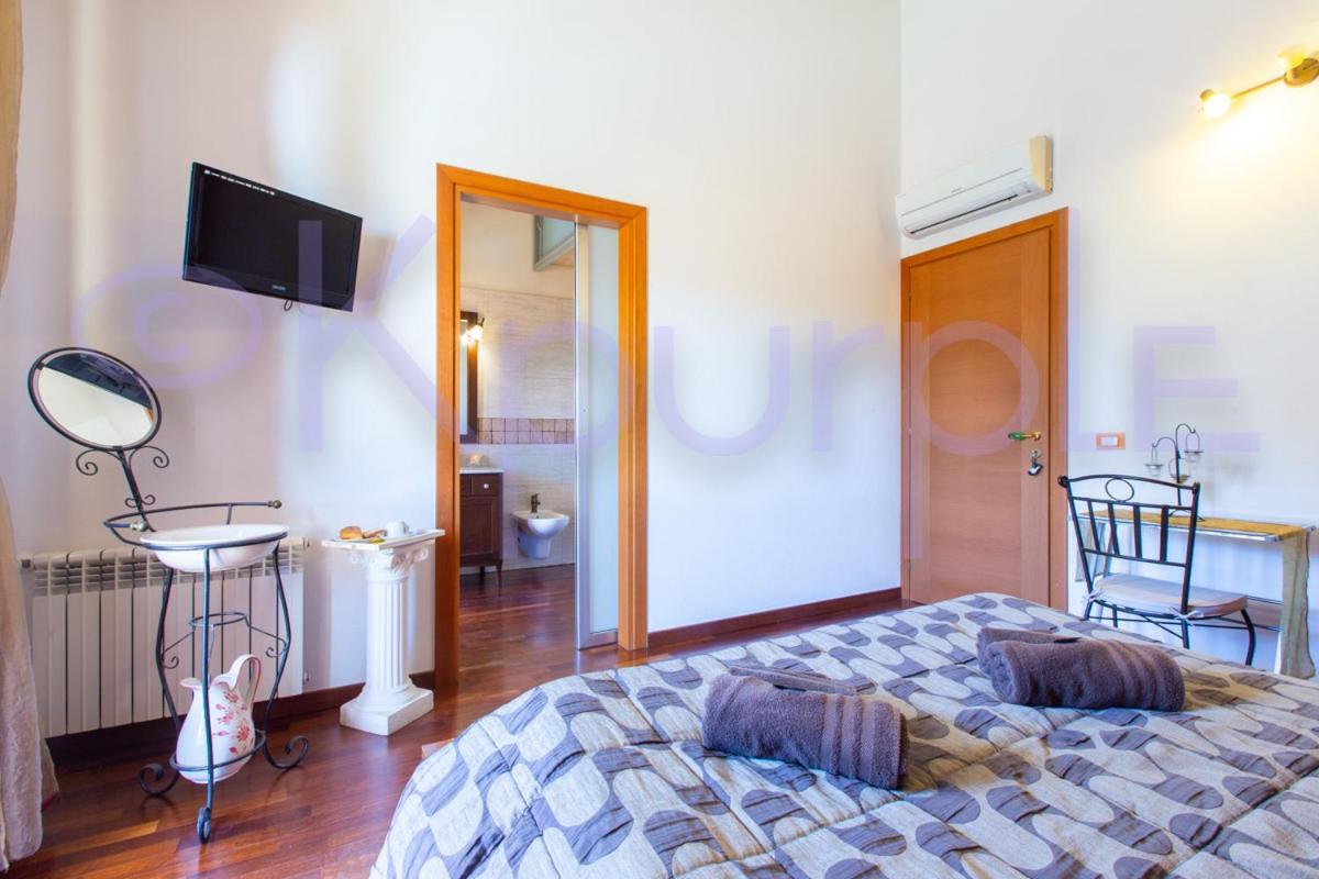 Le Api Hotel กาญารี ภายนอก รูปภาพ