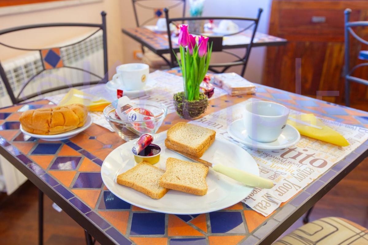 Le Api Hotel กาญารี ภายนอก รูปภาพ